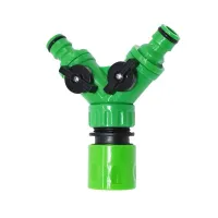 Coupler with valves for garden hoses