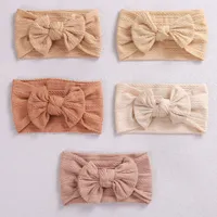 Children's elastic hairband with bow