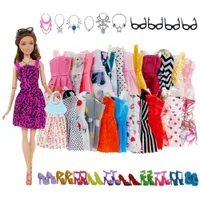 Set of outfits and accessories for Barbie doll