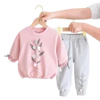 Girl's cute tracksuit in powder pink