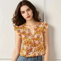 Women's blouse with V-neck, floral pattern and decorative ruffle