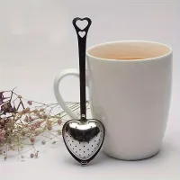 Practical tea sieve in the shape of a heart made of stainless steel with comfortable handle