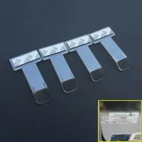 Adhesive clip for windshield