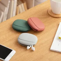 Portable silicone storage box for cables, headphones and coins