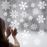 Beautiful Christmas stickers in the shape of a snowflake on the window