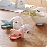 Cute duck shaped kibble scoop with a pin to close the bag Rainer