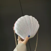Női kagyló alakú jegyzet csillámmal