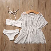 Girl two-piece swimsuit with tunic blouse