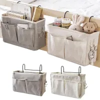 Portable hanging organizer with storage space for necessity for the child