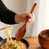 Wooden kitchen spoon with long handle