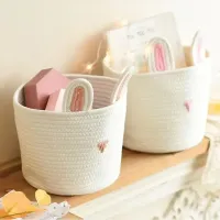 Cozy and decorative basket of knitted cotton rope for children and small things