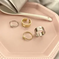 Set of 2 paired rings with bow tie