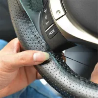 Quality steering wheel cover including needle and thread