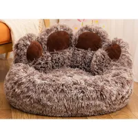 Dog and cat bed in the shape of a bear's paw - soothing donut bed for dogs