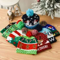Luminous cap with pompom and Christmas motif