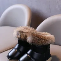 Stylish and warm children's snow boots for boys and girls - perfect for winter adventures