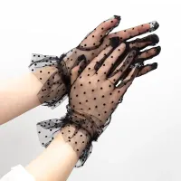 Luxurious women's gloves made of tulle material with stylish lashing in the wrist - more variants