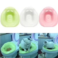 Cat toilet on toilet seat