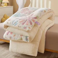 Beautiful and warm patchwork winter bed made of floral fleece with feather filling, ideal for bedroom and guest room