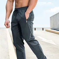 Pantalon de survêtement ample pour hommes avec cordon de serrage, adapté à la course et au jogging, pour l'hiver et l'automne, style décontracté