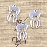 15 pieces of antique silver tooth pendants for DIY jewelry creation