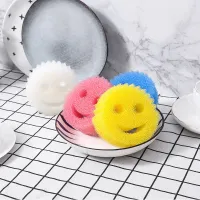 Magic dish sponge in the shape of a smiley face