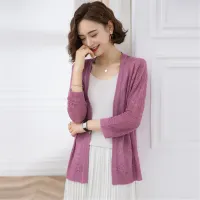 Women's knitted cardigan with broken pattern in vintage style