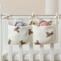 Organizer for diapers with teddy bear - hang on to stroller