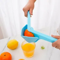 Portable manual citrus press - easy pressing of lemons and oranges for outdoor barbecue and camping