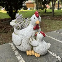 Decorative flower pot in the shape of a hen made of resin