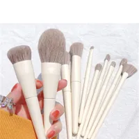 10 piece set of cosmetic brushes for face, powder, brightening, eye shadow and eyebrows forming