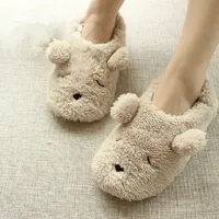 Women's slippers in the shape of a dog