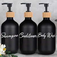 Čierne dávkovače na sprchový gél, šampón a kondicionér