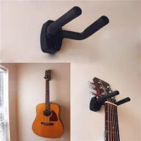Wall-mounted guitar stand