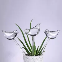 Designer automatic watering machine for domestic flowers in the shape of a bird Jerold