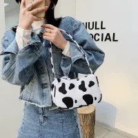 Modern shoulder bag with animal print Kurt