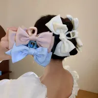 Pinza de pelo de moda para mujer decorada con lazo