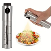 Escape resistant stainless steel oil dispenser for kitchen and barbecue - Press dispenser with olive oil dispenser and saucer - Kitchen Dishes and Needs