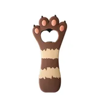 Bottle opener in the shape of a paw