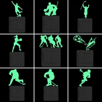 Modern phosphorescent sticker in hockey player motifs for easy finding of the switch in the dark