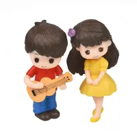 Decorative figures boy and girl