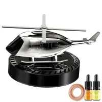 Car air freshener in the shape of a helicopter