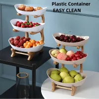 2/3 Floor creative fruit rack made of durable plastic with wooden stand