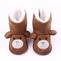 Warm baby booties with teddy bear