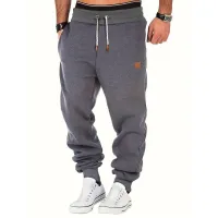 Men's sweatpants with drawstring, pockets and jogger cut for autumn/winter - for running and jogging