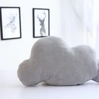 Baby pillow in the shape of a cloud