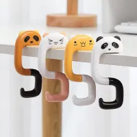 "A cute bag hook in the shape of an animal - portable, plastic."