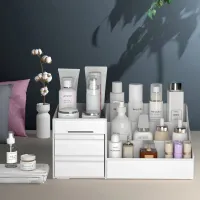 Beauty organizer with drawer and storage space for cosmetics and jewelry