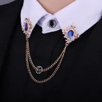 Luxurious men's brooch in the collar of Gia's shirt
