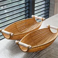 Fruit basket with rustic charm: hand woven from imitation rattan with wooden handles, ideal as decoration